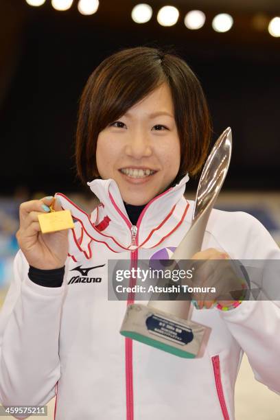 Shoko Fujimura of Japan poses with her gold medal in the women's 3000m victory ceremony during Japan Speed Skating Olympic Qualifying Championships...