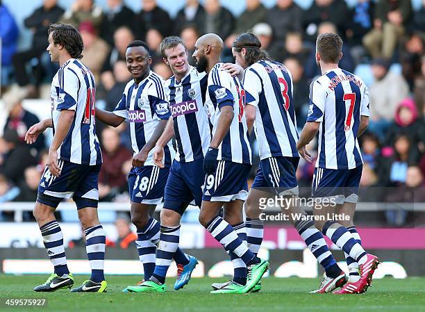 Nicolas Anelka of West Brom celebrates scoring their first goal with Chris Brunt of West Brom during the Barclays Premier League match between West...
