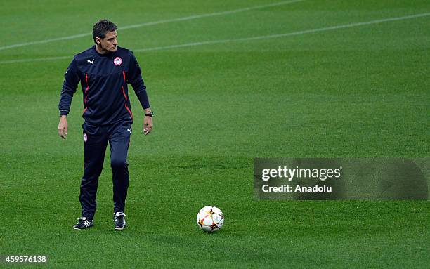 Head coach of Olympiacos F.C. , Jose Miguel Gonzalez Martin del Campo attends the training session ahead of the UEFA Champions League football match...