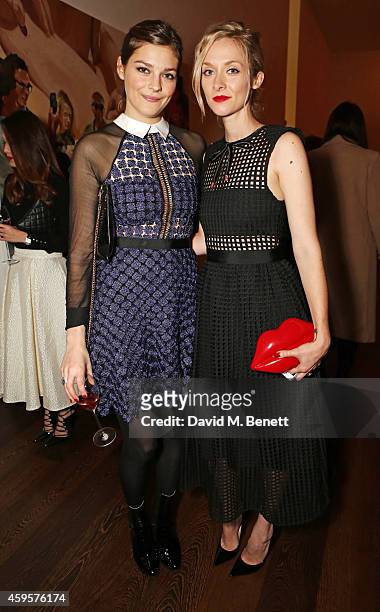 Amber Anderson and Portia Freeman attend a dinner to celebrate Self-Portrait Studio's 1st Anniversary with Han Chong at Victoria Miro Gallery on...
