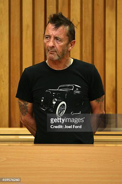 Drummer Phil Rudd appears in court after being charged with threatening to kill and possession of meth and marijuana at Tauranga District Court on...