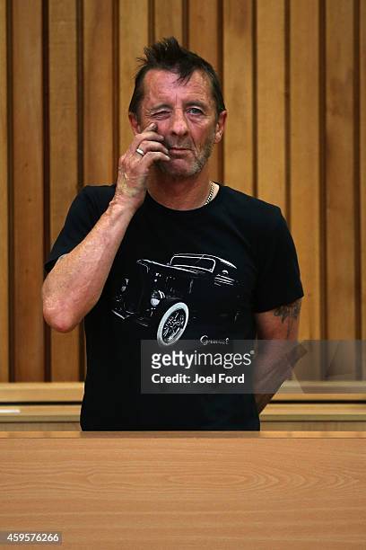 Drummer Phil Rudd appears in court after being charged with threatening to kill and possession of meth and marijuana at Tauranga District Court on...