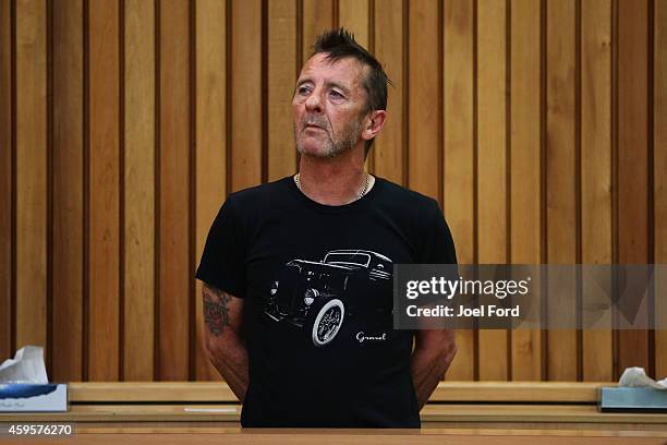 Drummer Phil Rudd appears in court after being charged with threatening to kill and possession of meth and marijuana at Tauranga District Court on...