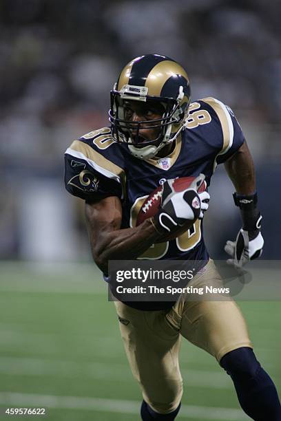 Isaac Bruce of the St. Louis Rams runs with the ball during a game against the Chicago Bears on December 11, 2006 at the Edward Jones Dome Stadium in...