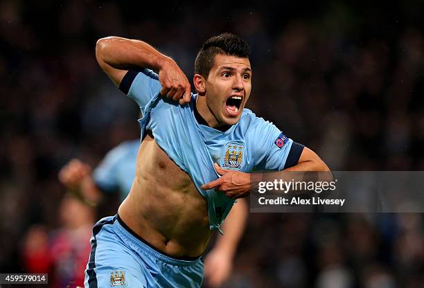 Sergio Aguero of Manchester City celebrates after scoring his team's third and matchwinning goal during the UEFA Champions League Group E match...
