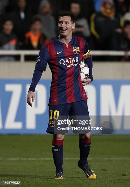 Barcelona's Argentinian forward Lionel Messi reacts during their UEFA Champions League football match against Apoel at the Neo GSP Stadium in the...