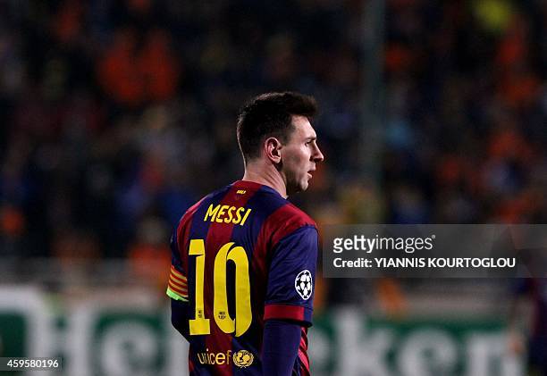 Barcelona's Argentinian forward Lionel Messi reacts during their UEFA Champions League football against Apoel match at the Neo GSP Stadium in the...