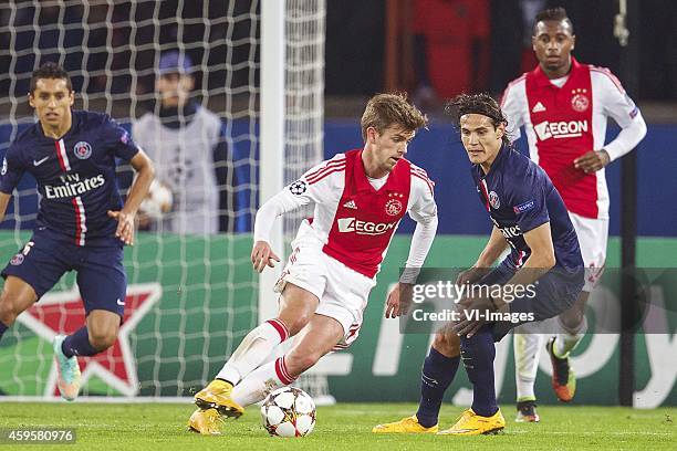 Marquinhos of Paris Saint-Germain, Lucas Andersen of Ajax, Edison Cavani of Paris Saint-Germain, Stefano Denswil of Ajax during the UEFA Champions...