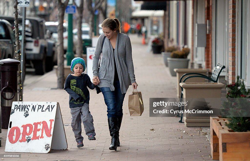 Politicians and officials from the SBA visited small businesses in Olde Town Arvada in advance of Small Business Saturday.