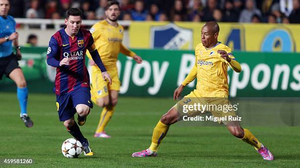 Lionel Messi of FC Barcelona manages the ball during the Champions League match between Apoel FC and FC Barcelona at GSP Stadium on November 25, 2014...