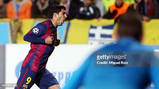 Luis Suarez of FC Barcelona celebrates the first goal during the Champions League match between Apoel FC and FC Barcelona at GSP Stadium on November...