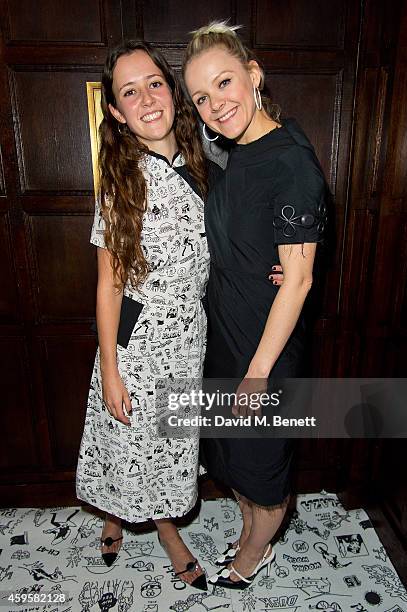 Ashley Williams and Fran Burns attends the Ashley Williams x Red or Dead preview dinner at Rules Restaurant on November 25, 2014 in London, England.