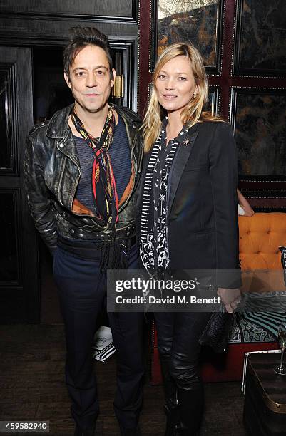 Jamie Hince and Kate Moss attend the launch of the Rockins For Eyeko collection at The Scotch of St James on November 25, 2014 in London, England.