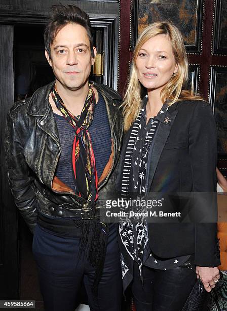 Jamie Hince and Kate Moss attend the launch of the Rockins For Eyeko collection at The Scotch of St James on November 25, 2014 in London, England.