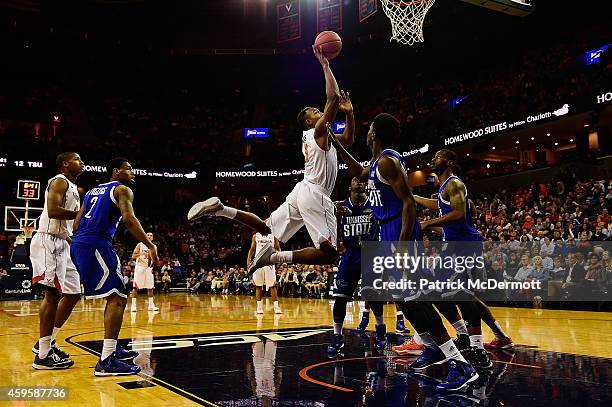 Darion Atkins of the Virginia Cavaliers drives to the basket in the first half against the Tennessee State Tigers during a game at John Paul Jones...