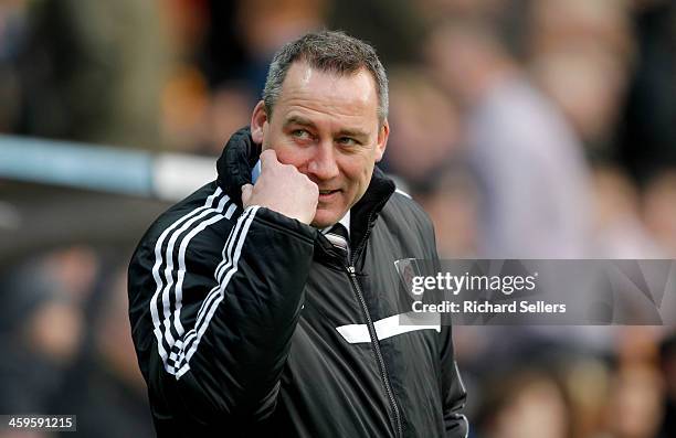 Rene Meulensteen manager of Fulham looks on during the Barclays Premier League match between Hull City and Fulham at KC stadium on December 28, 2013...