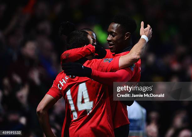 Danny Welbeck of Manchester United celebrates with Javier Hernandez as he scores their first goal during the Barclays Premier League match between...