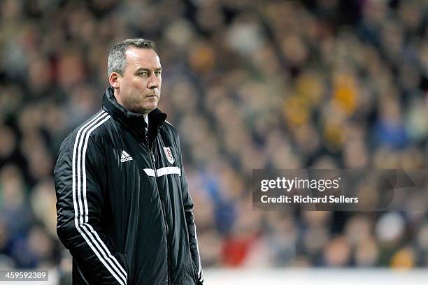 Rene Meulensteen manager of Fulham looks on during the Barclays Premier League match between Hull City and Fulham at KC stadium on December 28, 2013...