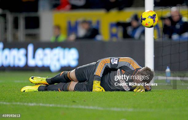 Robbie Stockdale of Fulham lies beaten after Hull City score their 3rd goal during the Barclays Premier League match between Hull City and Fulham at...