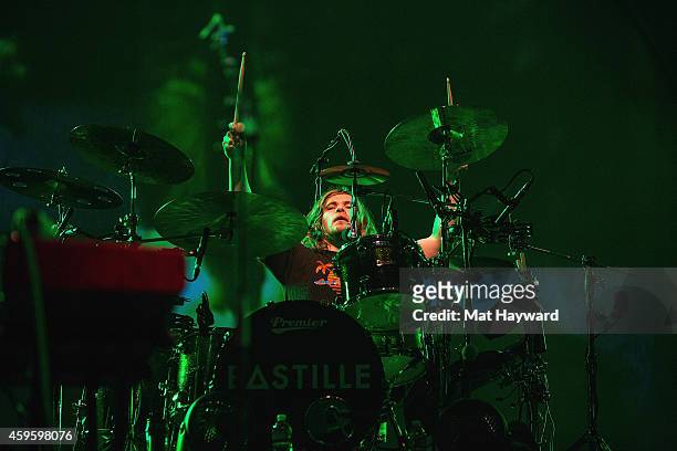 Drummer Chris "Woody" Wood of Bastille performs on stage at KeyArena on November 25, 2014 in Seattle, Washington.