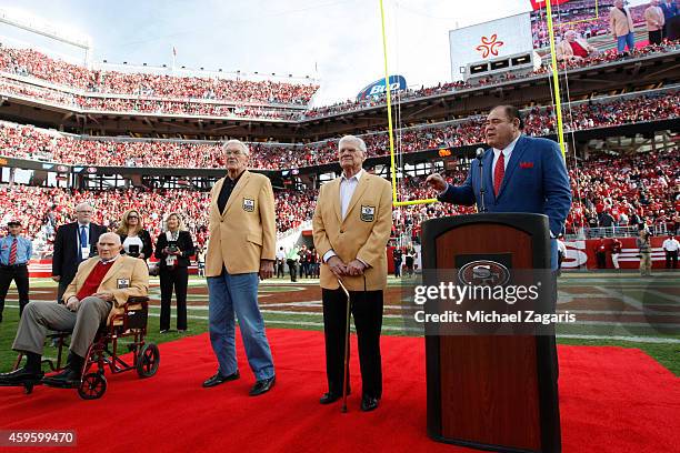 San Francisco 49ers alumni Y. A. Tittle, Bob St. Clair and Hugh McElhenny are honored during a halftime ceremony during the game against the...