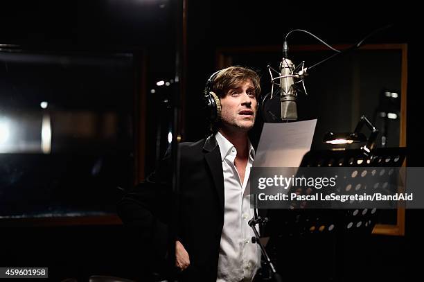 Thomas Dutronc performs during the Band Aid 30 "Noel est la" Recording on November 23, 2014 in Paris, France.