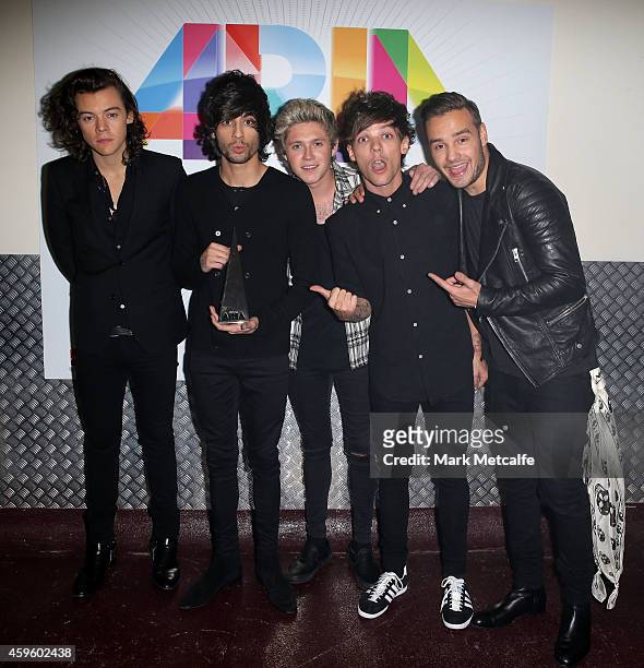 One Direction Harry Styles, Zayn Malik, Niall Horan, Louis Tomlinson and Liam Payne pose for a portrait backstage during the 28th Annual ARIA Awards...
