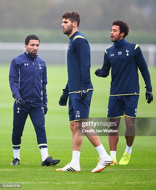 Aaron Lennon, Federico Fazio and Mousa Dembele look on during a Tottenham Hotspur FC training session, ahead of the UEFA Europa League Group C match...