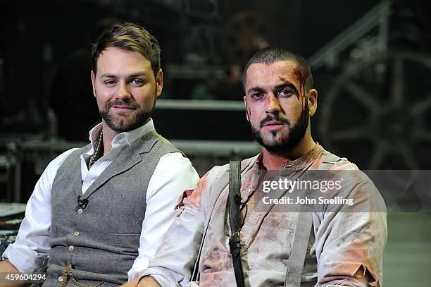 Brian McFadden and Shayne Ward performs during a dress rehearsal for 'War of the Worlds' on November 25, 2014 in London, England.