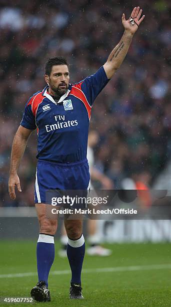 The message tattoed on the inner arm of referee Steve Walsh reads " he who controls himself controls the game" during the match between England and...