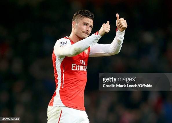 olivier-giroud-of-arsenal-gives-a-thumbs-up-during-the-barclays-premier-league-match-between.jpg
