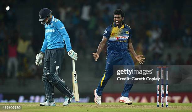 Thisara Perera of Sri Lanka celebrates dismissing Joe Root of England during the 1st One Day International between Sri Lanka and England at R....