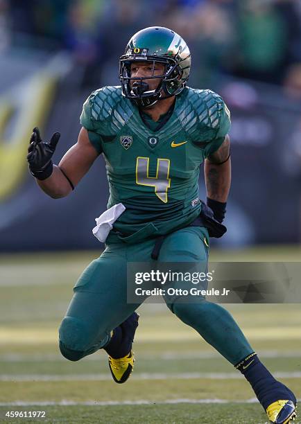 Safety Erick Dargan of the Oregon Ducks defends against wide receiver Tyler McCulloch of the Colorado Buffaloes at Autzen Stadium on November 22,...