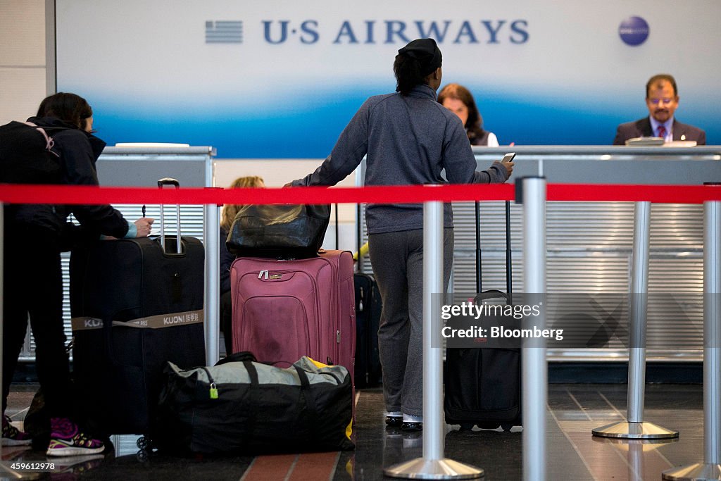 Inside Reagan National Airport As Winter Storm Cato Disrupts Thanksgiving Travel