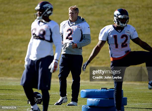 Denver Broncos quarterback Zac Desert stretches during practice November 26, 2014 at Dove Valley.