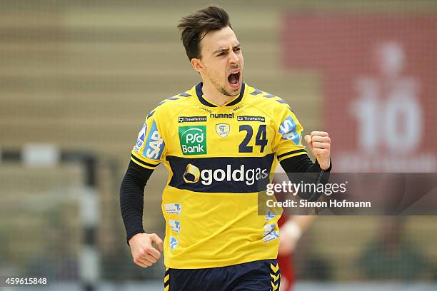 Patrick Groetzki of Rhein-Neckar Loewen celebrates during the DKB Handball Bundesliga match between TSG Ludwigshafen-Friesenheim and Rhein-Neckar...