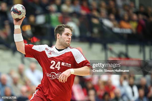 Nico Buedel of Ludwigshafen throws teh ball during the DKB Handball Bundesliga match between TSG Ludwigshafen-Friesenheim and Rhein-Neckar Loewen at...