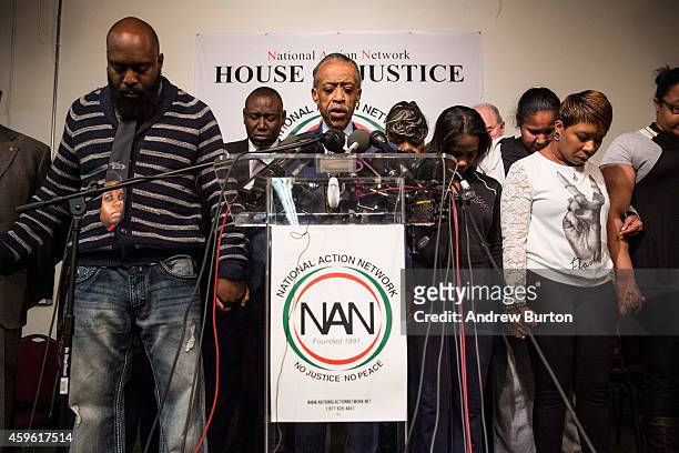 Michael Brown Sr., father of Michael Brown Jr.; Benjamin Crump, lawyer for Michael Brown Jr's family; Reverand Al Sharpton; Kimberly Michelle...