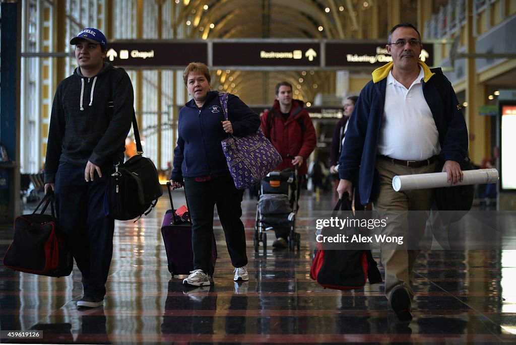 Holiday Travelers Crowd Airports And Roads Ahead Of Thanksgiving Holiday