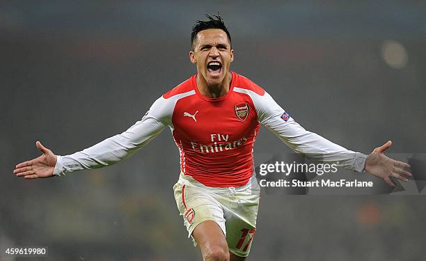 Alexis Sanchez celebrates scoring the 2nd Arsenal goal during the UEFA Champions League match between Arsenal and Borussia Dortmund at Emirates...