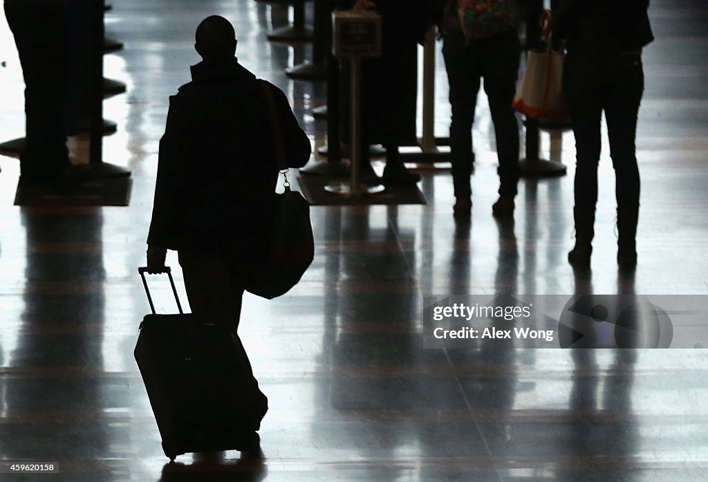 Holiday Travelers Crowd Airports And Roads Ahead Of Thanksgiving Holiday