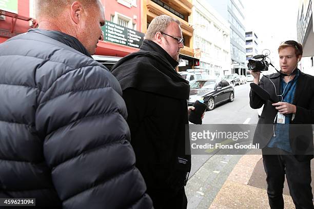 Internet Mana Party Founder Kim Dotcom appears at Auckland District Court on November 27, 2014 in Auckland, New Zealand. Dotcom was raided in 2012...