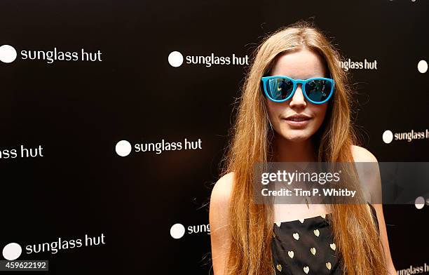 Katie Readman attends the Sunglass Hut Unwrap Something Shady event at Sunglass Hut on November 26, 2014 in London, England.