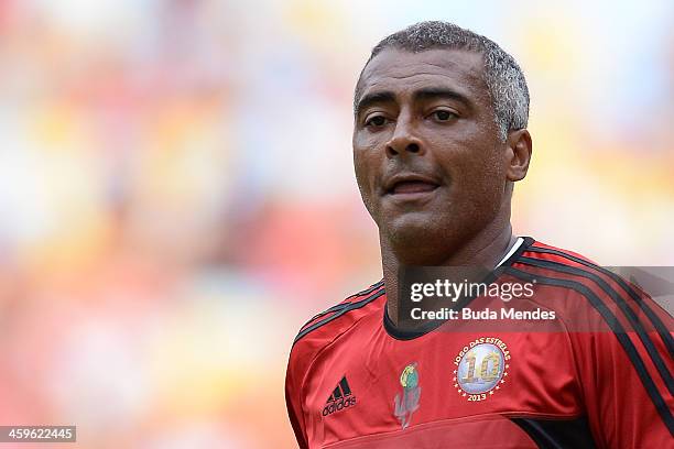 Brazilian former football star Romario looks on during a charity football match organized by former Brazilian national team player Zico, at Maracana...