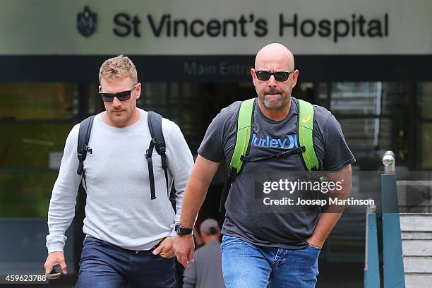 Australian cricket coach Darren Lehmann and Aaron Finch leave St Vincent's Hospital on November 27, 2014 in Sydney, Australia. South Australian...