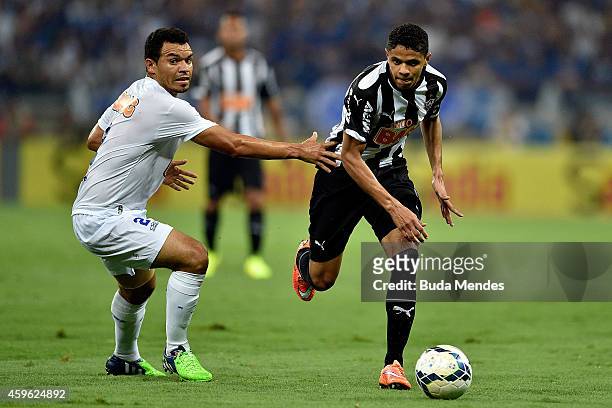 Douglas Santos of Atletico MG struggles for the ball with a Ceara of Cruzeiro during a match between Atletico MG and Cruzeiro as part of Copa do...