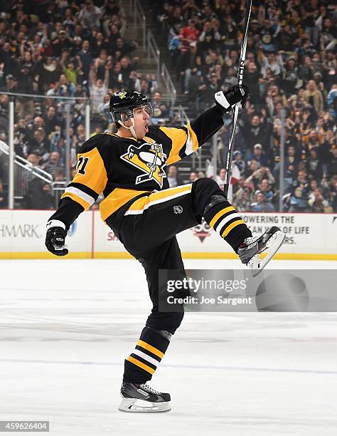 Evgeni Malkin of the Pittsburgh Penguins celebrates his powerplay goal during the first period against the Toronto Maple Leafs at Consol Energy...