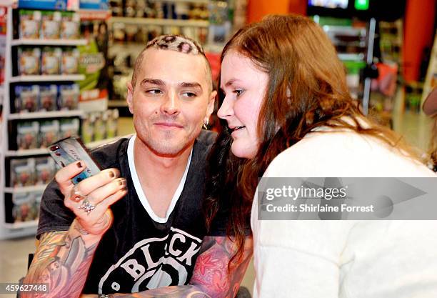 Matt Willis of McBusted meets fans and signs copies of their album 'McBusted' at HMV on November 26, 2014 in Leeds, England.