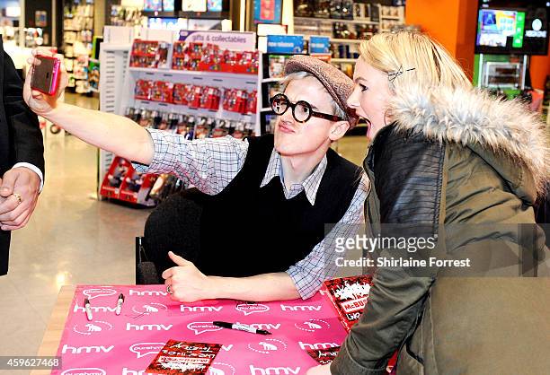 Tom Fletcher of McBusted meets fans and signs copies of their album 'McBusted' at HMV on November 26, 2014 in Leeds, England.