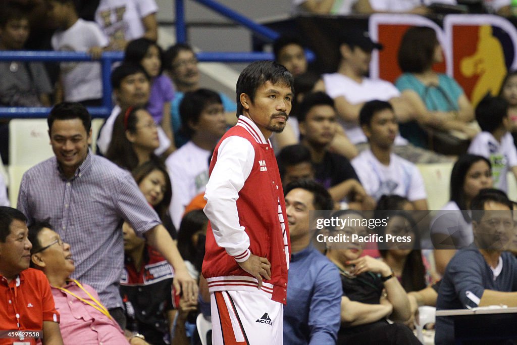 Manny Pacquiao head coach of KIA Sorento eyes looks on in...